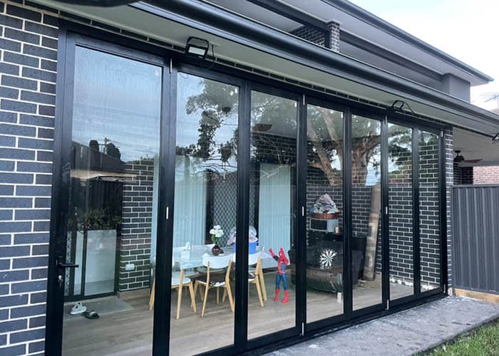 Black framed glass wall exterior
