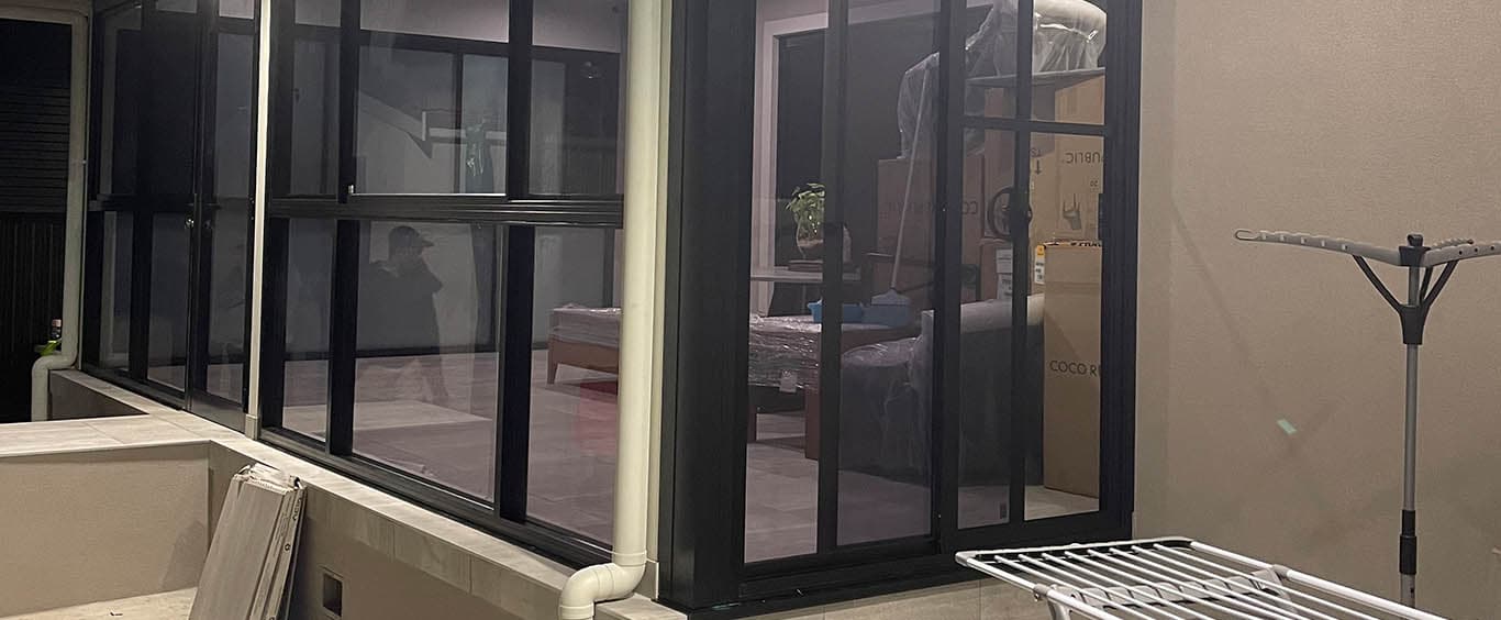 Black framed external aluminium windows and doors